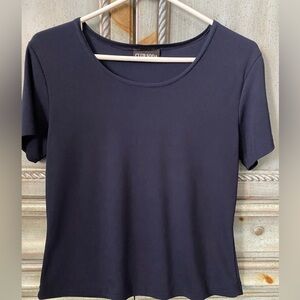 Navy blue short sleeve, knit top with shallow scoop neck